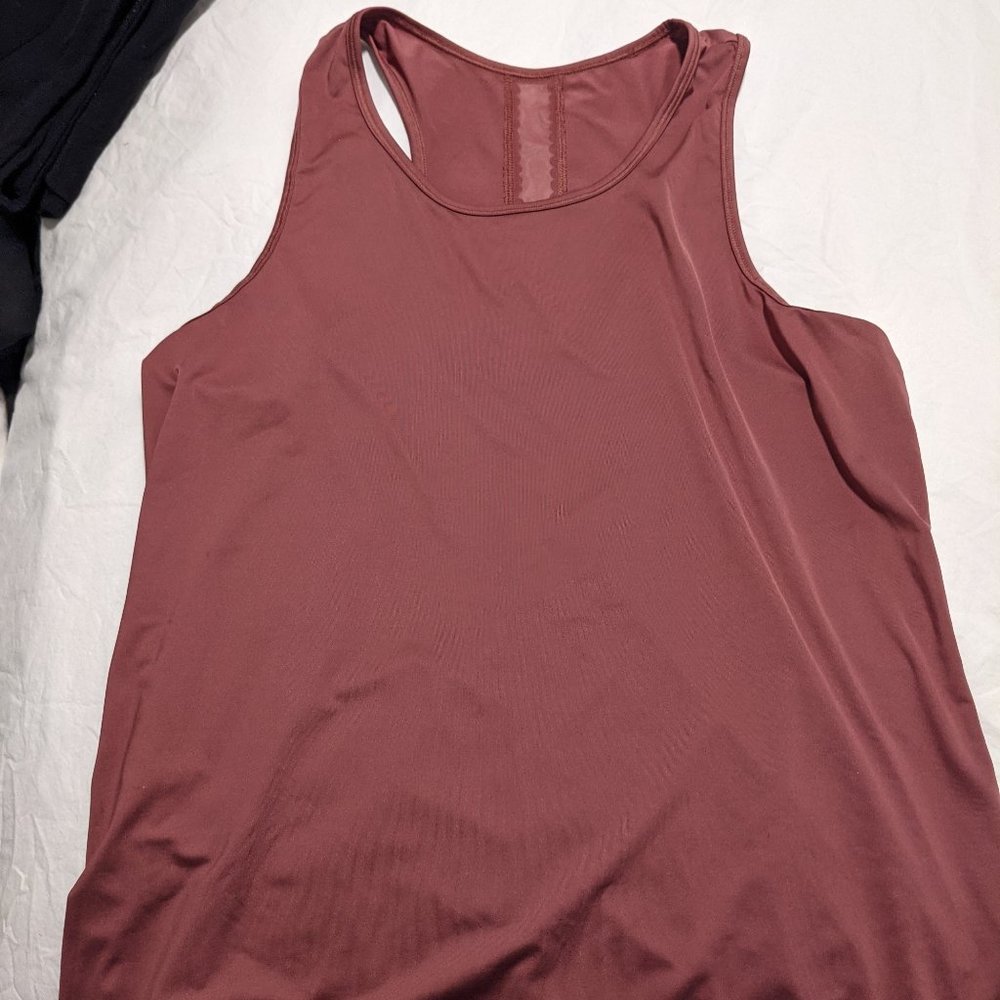 Core 10 tank with scalloped cutout